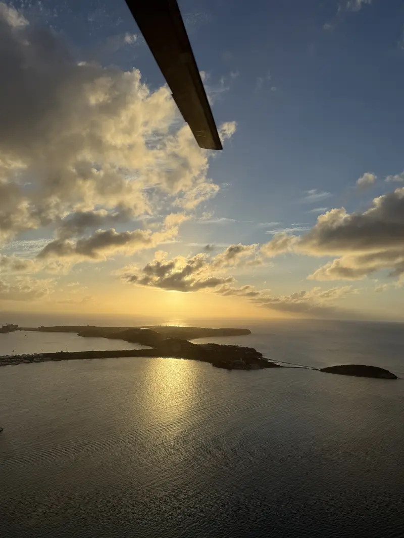 Sunset over the sea and the islands seen from Aura.