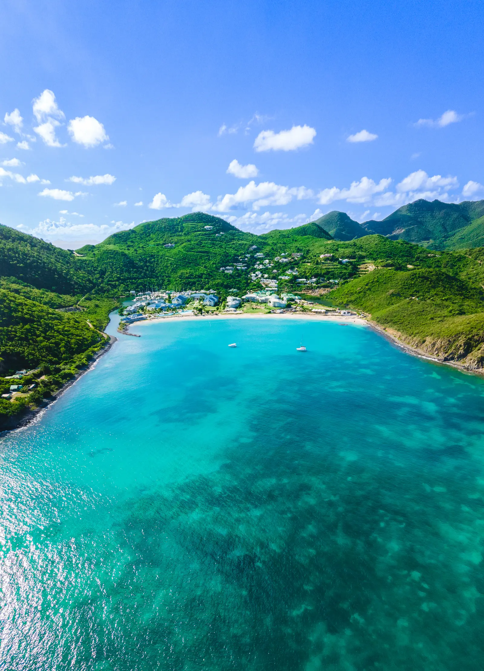 Aerial view of the turquoise water and beach of Anse Marcel.