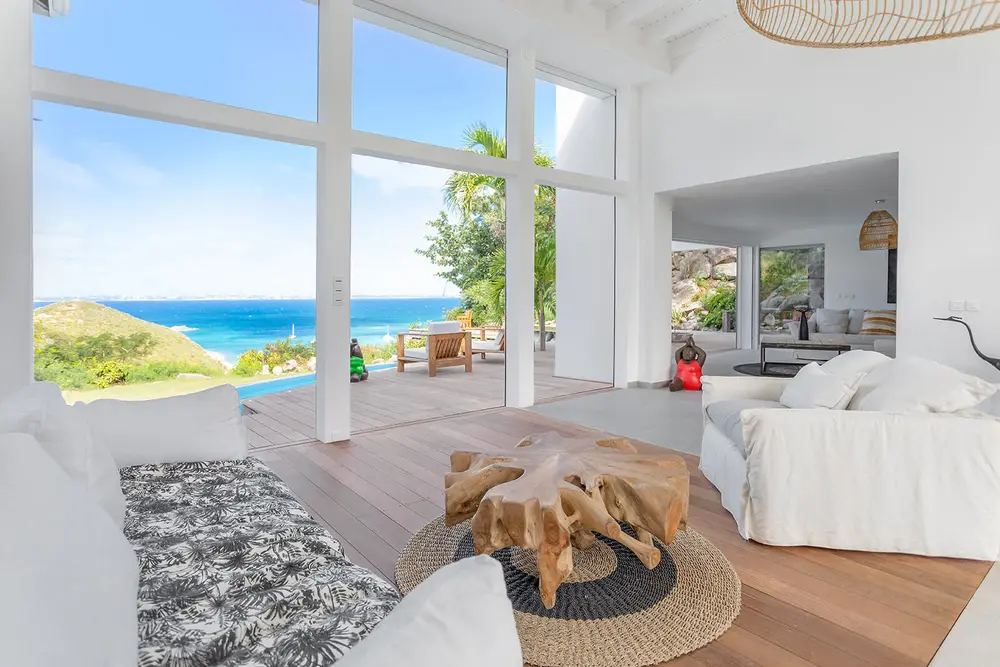 Window opening on the sea and the terrace.